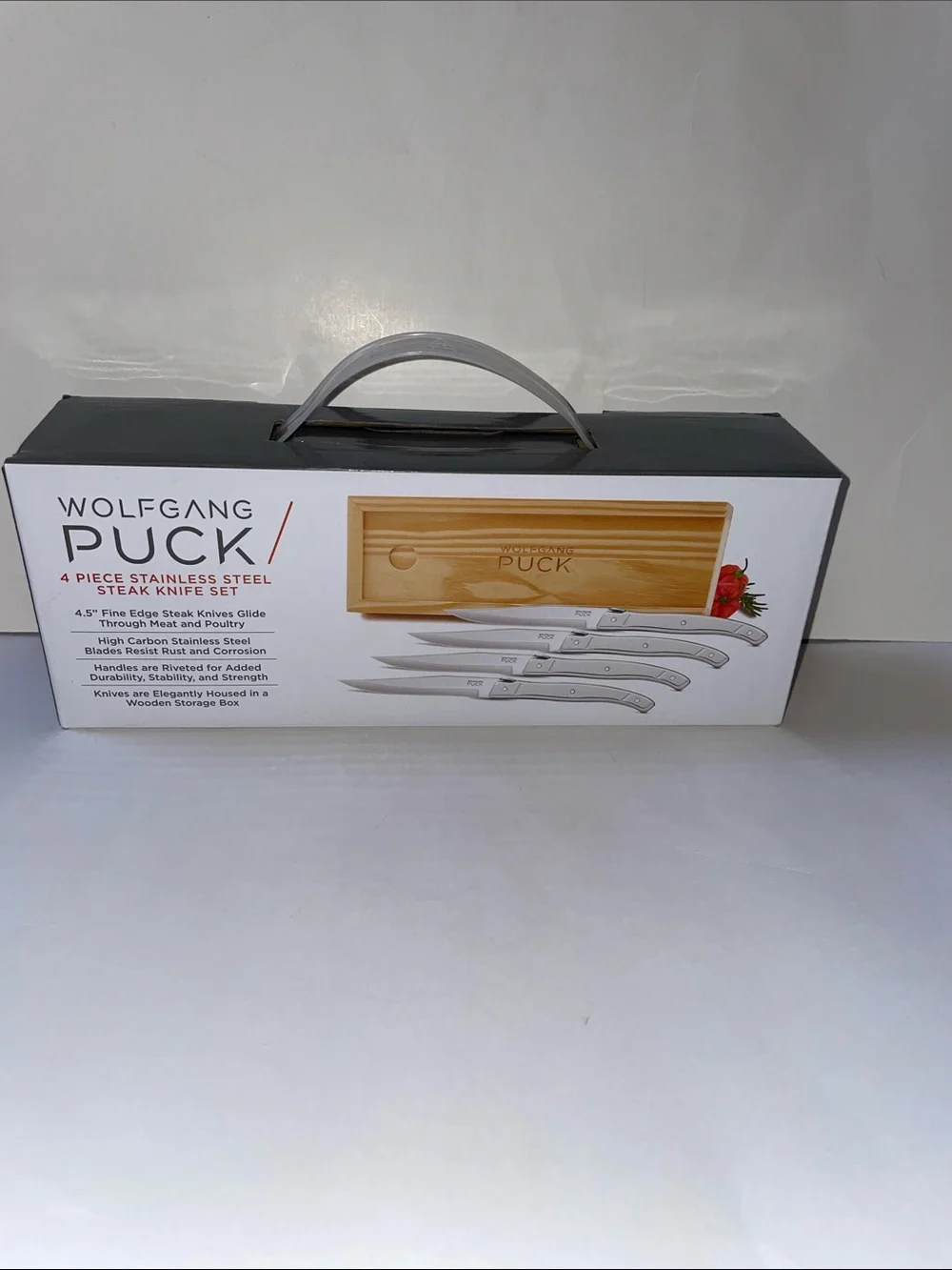 NIB Wolfgang Puck 4-Piece Stainless Steel Steak Knife Set.